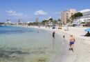 travel restriction -People sunbathe at Magaluf beach in Mallorca